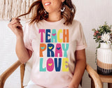 TEACH PRAY LOVE